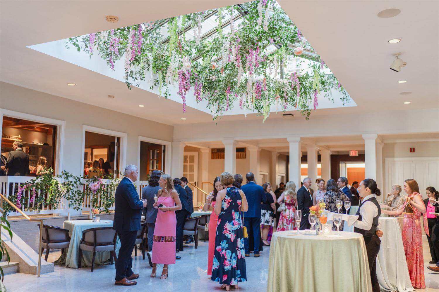 Wedding cocktail hour in the Grand Foyer at Arts District Mansion Dallas